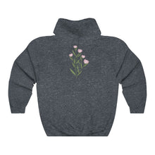 Load image into Gallery viewer, Heather Navy Flourished Hoodie back side with bloomed pinky bud flower.
