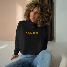 Load image into Gallery viewer, Lady wearing the black Bloom Crop Hoodie 
